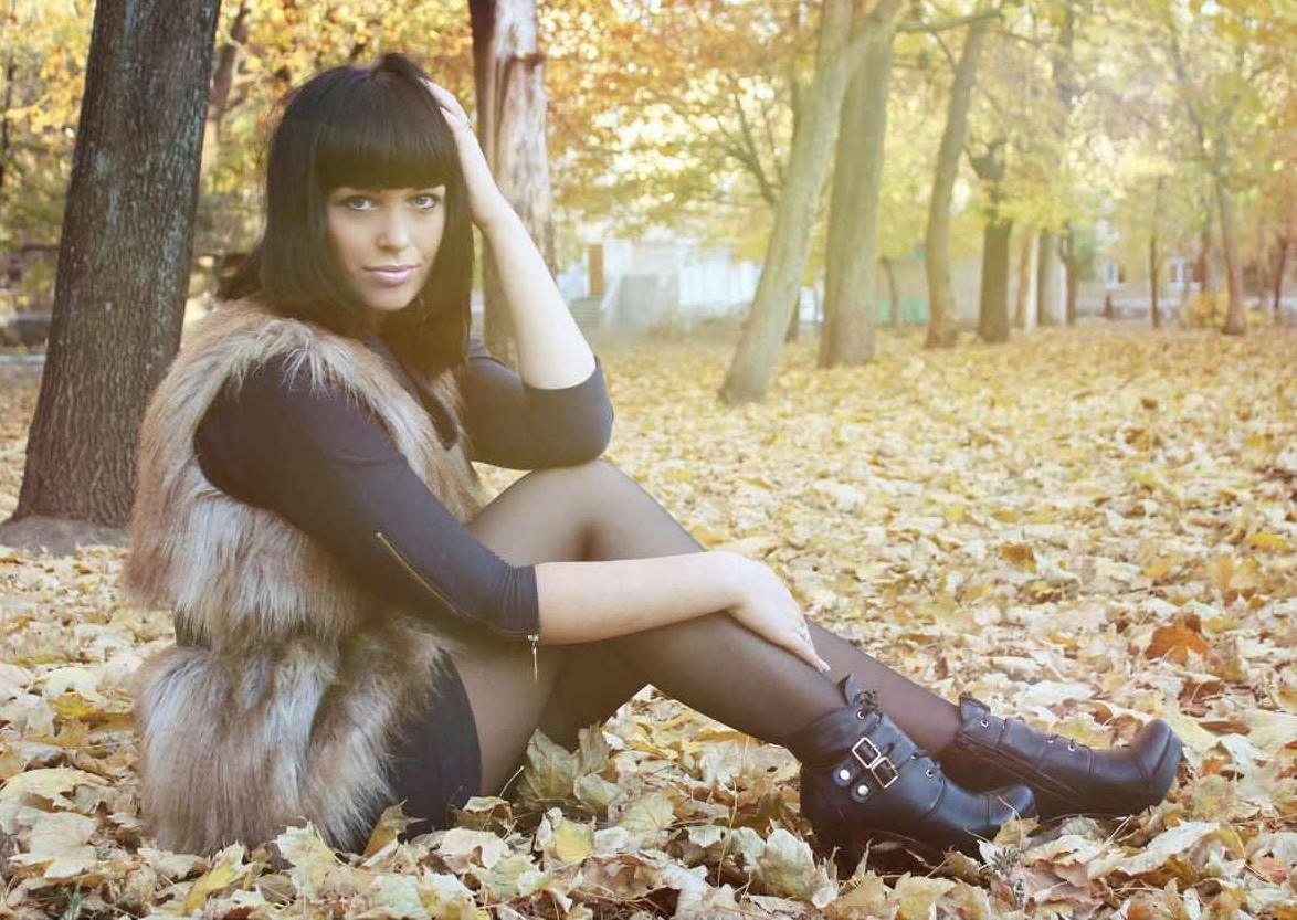 Brunette Girl wearing Fur Coat and Black Sheer Pantyhose